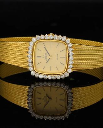 Omega De Ville lady 60s 18 kt gold diamonds bezel