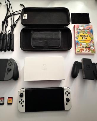 Nintendo Switch Oled con giochi e accessori