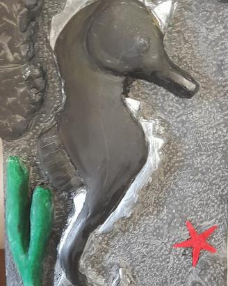 scultura su ardesia