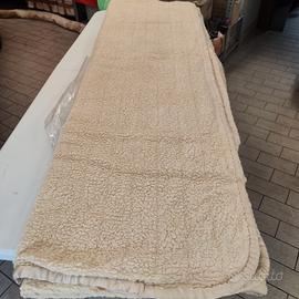 Coprimaterasso e coperta matrimoniale