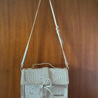Borsa Krizia  effetto pitone