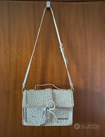 Borsa Krizia  effetto pitone