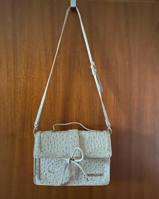 Borsa Krizia  effetto pitone