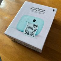 Macchina fotografica istantanea verde acqua