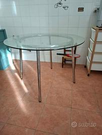 Tavolo rotondo piano in cristallo gambe in acciaio