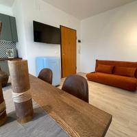 Divano Maison du Monde  2 posti in velluto arancio