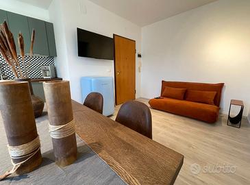 Divano Maison du Monde  2 posti in velluto arancio