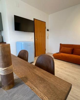 Divano Maison du Monde  2 posti in velluto arancio