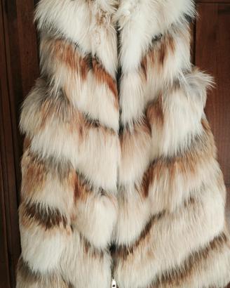 Pelliccia smanicata con tasche