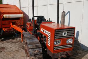 Trattore fiat cingolato con attrezzi