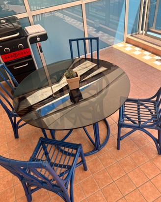 Set tavolo in vetro cristallo e rattan con sedie