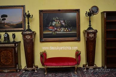 Coppia di antichi candelabri in bronzo