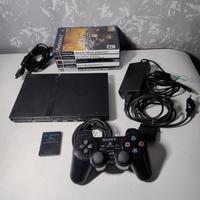 Playstation 2 slim con 5 giochi e cavi