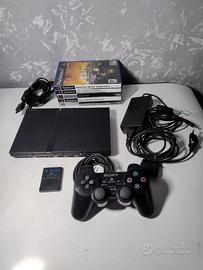 Playstation 2 slim con 5 giochi e cavi