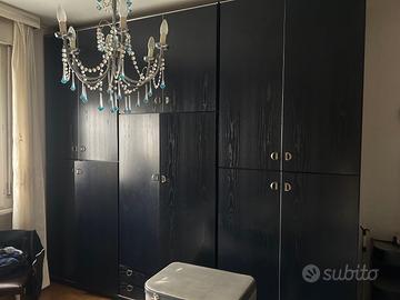 Camera matrimoniale in legno palissandro blu