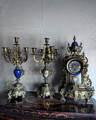 Trittico antico orologio e candelabri