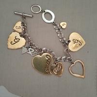 bracciale con ciondoli guess
