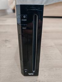 Nintendo WII nera con balance board e 2 controller