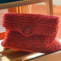 Pochette arancio con bottone