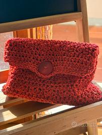 Pochette arancio con bottone