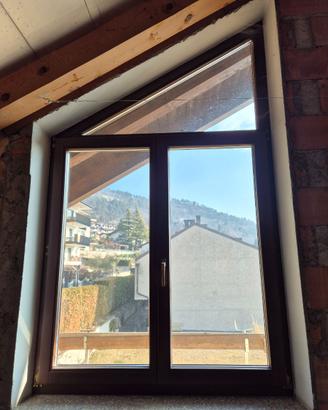 Finestra speculare doppia apertura