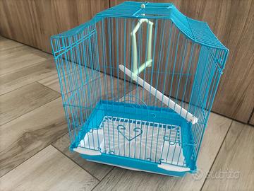 gabbia per uccellini azzurra e bianca 