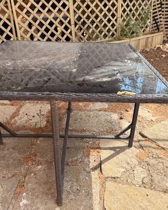 Tavolo da giardino in rattan con piano in vetro