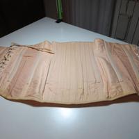 corsetto con stecche per dolori alla schiena