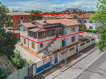 APPARTAMENTO BICAMERE CON GIARDINO IN BIFAMILIARE