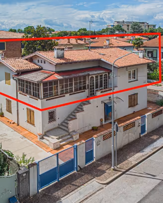 APPARTAMENTO BICAMERE CON GIARDINO IN BIFAMILIARE