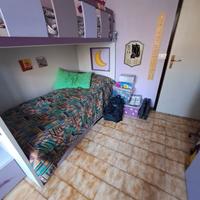 Cameretta bambina con due letti a castello