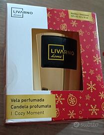 Candela aromatica in bicchiere di vetro con decoro