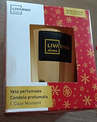 Candela aromatica in bicchiere di vetro con decoro