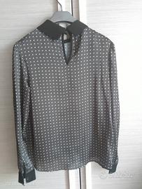 Blusa a pois grigia e bianche