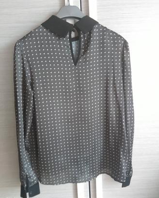Blusa a pois grigia e bianche
