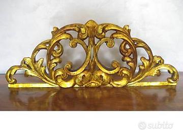 fregio ligneo sopraporta 1700 foglia oro restauro