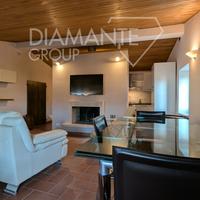 Appartamento su due piani vista lago