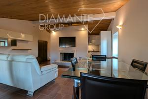 Appartamento su due piani vista lago