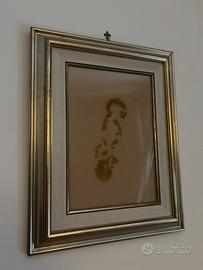 Collezione di quadri con cornici