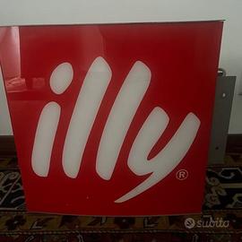 Insegna luminosa Illy Caffè a bandiera