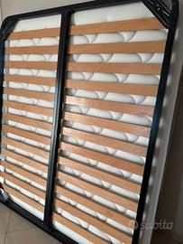 Letto matrimoniale composto da rete e materasso