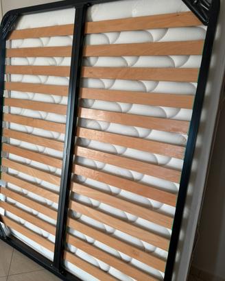 Letto matrimoniale composto da rete e materasso