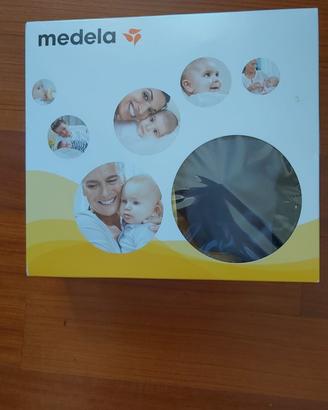 Tiralatte medela