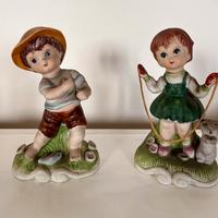 Coppia di statuine in porcellana di Capodimonte