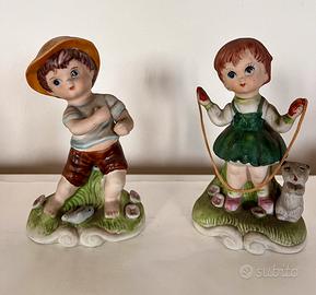 Coppia di statuine in porcellana di Capodimonte