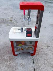 Cucina giocattolo con accessori  e monopattino