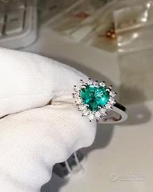 Anello oro18k Smeraldo intratt e diamanti naturali
