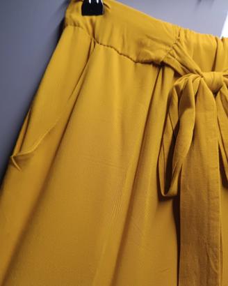 pantaloni sopra la caviglia