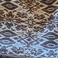 coperta tessuta a mano con telaio artigianale