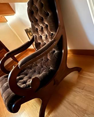 Poltrona vintage stile Chesterfield.